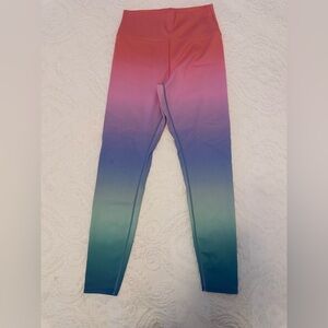 Beach riot, rainbow leggings.